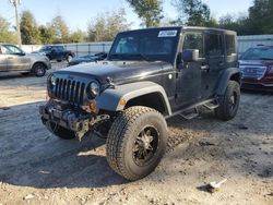 Salvage cars for sale from Copart Midway, FL: 2013 Jeep Wrangler Unlimited Sahara