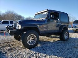 Salvage cars for sale from Copart Prairie Grove, AR: 2002 Jeep Wrangler / TJ Sport