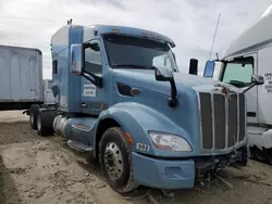 Salvage trucks for sale at Grand Prairie, TX auction: 2016 Peterbilt 579