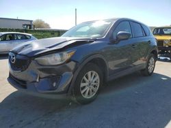 Salvage cars for sale from Copart Orlando, FL: 2013 Mazda CX-5 Touring