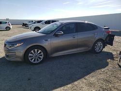 Salvage cars for sale from Copart Adelanto, CA: 2016 KIA Optima EX