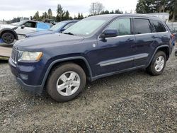 Flood-damaged cars for sale at auction: 2012 Jeep Grand Cherokee Laredo