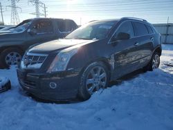 Salvage cars for sale at Elgin, IL auction: 2011 Cadillac SRX Premium Collection