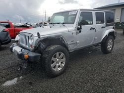 Vehiculos salvage en venta de Copart Eugene, OR: 2011 Jeep Wrangler Unlimited Jeep 70TH Anniversary