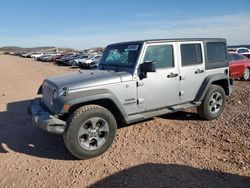 Salvage cars for sale at Phoenix, AZ auction: 2016 Jeep Wrangler Unlimited Sport