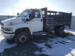 Salvage trucks for sale at Brighton, CO auction: 2005 Chevrolet C5500 C5C042