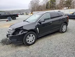 Salvage cars for sale at auction: 2011 Cadillac SRX Luxury Collection