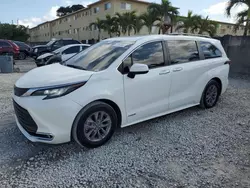 Salvage cars for sale at Opa Locka, FL auction: 2021 Toyota Sienna XLE