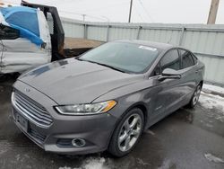 Salvage cars for sale at Magna, UT auction: 2013 Ford Fusion SE Hybrid