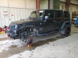 Jeep salvage cars for sale: 2014 Jeep Wrangler Unlimited Sport