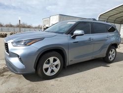 Salvage cars for sale at Fresno, CA auction: 2021 Toyota Highlander Hybrid LE