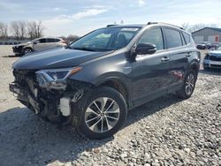 Salvage cars for sale at Barberton, OH auction: 2018 Toyota Rav4 HV LE