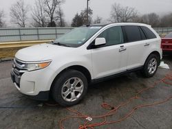 Salvage SUVs for sale at auction: 2011 Ford Edge SEL