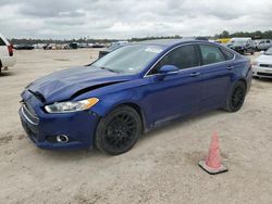 Salvage cars for sale at Houston, TX auction: 2014 Ford Fusion Titanium