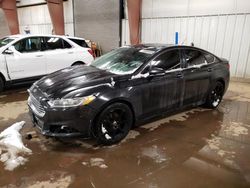 Salvage cars for sale at Lansing, MI auction: 2013 Ford Fusion Titanium