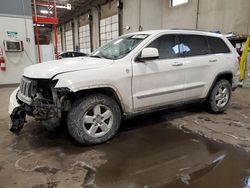 Salvage cars for sale at Blaine, MN auction: 2011 Jeep Grand Cherokee Laredo