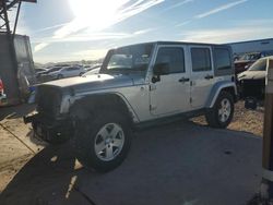 Salvage cars for sale at Phoenix, AZ auction: 2010 Jeep Wrangler Unlimited Sahara