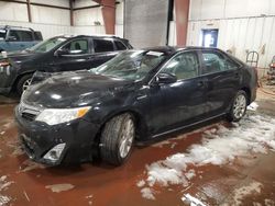 Salvage cars for sale at Lansing, MI auction: 2014 Toyota Camry Hybrid