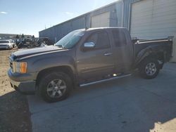 Salvage trucks for sale at Eldridge, IA auction: 2011 GMC Sierra K1500 SLE