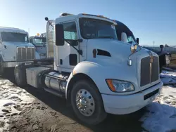 Salvage trucks for sale at Brighton, CO auction: 2011 Kenworth Construction T370