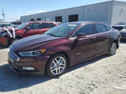 Salvage cars for sale at Jacksonville, FL auction: 2017 Ford Fusion SE Hybrid