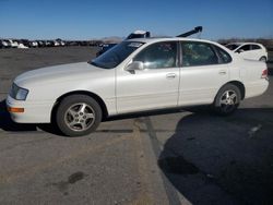 Salvage cars for sale at North Las Vegas, NV auction: 1997 Toyota Avalon XL