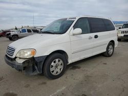 Salvage cars for sale at Bakersfield, CA auction: 2002 KIA Sedona EX