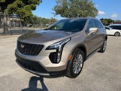 Salvage cars for sale at Opa Locka, FL auction: 2023 Cadillac XT4 Premium Luxury