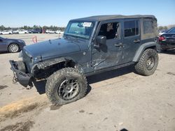 Salvage SUVs for sale at auction: 2016 Jeep Wrangler Unlimited Sport