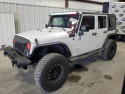 Salvage cars for sale at Byron, GA auction: 2015 Jeep Wrangler Unlimited Sport