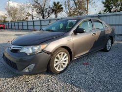 Carros salvage a la venta en subasta: 2014 Toyota Camry Hybrid