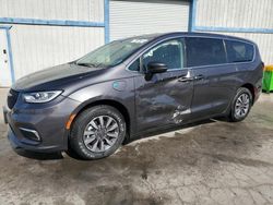 Chrysler Pacifica Hybrid Touring l salvage cars for sale: 2023 Chrysler Pacifica Hybrid Touring L