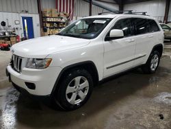 Salvage SUVs for sale at auction: 2011 Jeep Grand Cherokee Laredo