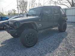 Salvage cars for sale at Riverview, FL auction: 2010 Jeep Wrangler Unlimited Sahara