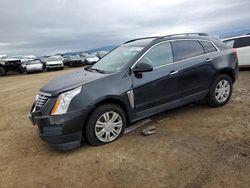 Carros salvage a la venta en subasta: 2014 Cadillac SRX