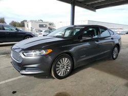 Salvage cars for sale at Hayward, CA auction: 2015 Ford Fusion SE Hybrid