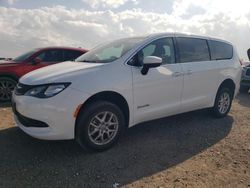 Salvage cars for sale at Houston, TX auction: 2022 Chrysler Voyager LX