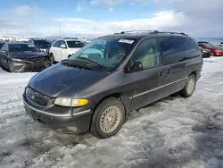 Salvage cars for sale at Helena, MT auction: 1997 Chrysler Town & Country LXI