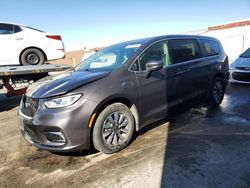 Chrysler Pacifica Hybrid Touring l salvage cars for sale: 2023 Chrysler Pacifica Hybrid Touring L