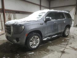 Salvage SUVs for sale at auction: 2021 GMC Yukon SLT