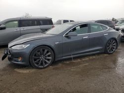 Salvage cars for sale at auction: 2015 Tesla Model S