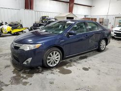 Lots with Bids for sale at auction: 2014 Toyota Camry Hybrid