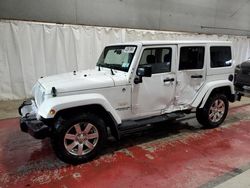 Jeep Wrangler salvage cars for sale: 2013 Jeep Wrangler Unlimited Sahara