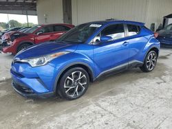 Salvage cars for sale at auction: 2019 Toyota C-HR XLE