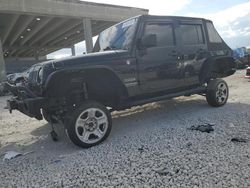 Salvage cars for sale at West Palm Beach, FL auction: 2013 Jeep Wrangler Unlimited Sport