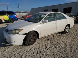 Flood-damaged cars for sale at auction: 2005 Toyota Camry LE