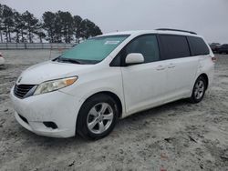 Salvage cars for sale at auction: 2011 Toyota Sienna LE