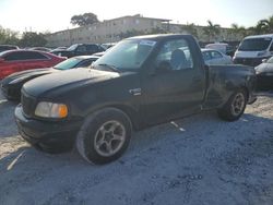 Salvage trucks for sale at Opa Locka, FL auction: 1999 Ford F150