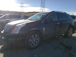 Salvage cars for sale at Littleton, CO auction: 2014 Cadillac SRX Luxury Collection