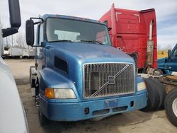 Salvage trucks for sale at Elgin, IL auction: 2000 Volvo VN Semi Truck